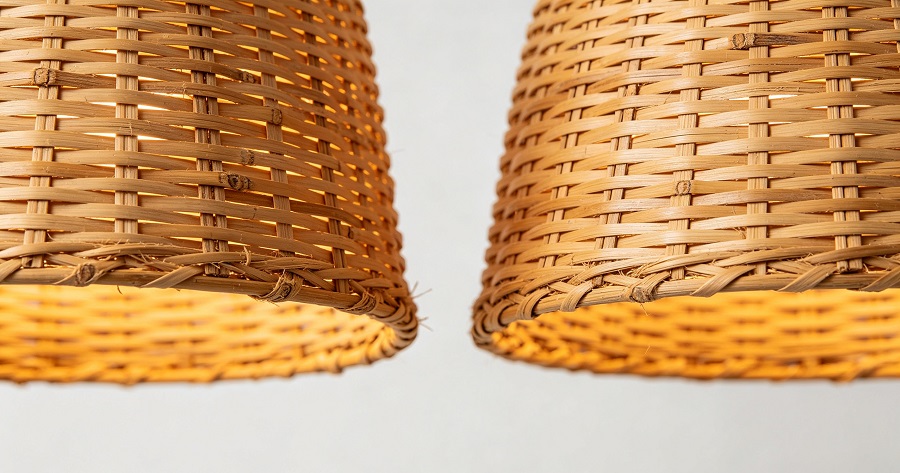 Natural variation in handcrafted rattan lamp weaving patterns