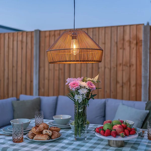Rattan pendant light for outdoor dining table