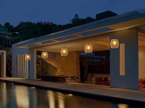 Hanging rattan lanterns by the pool