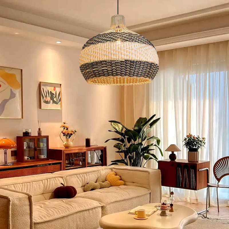 A rattan pendant light in the center of the living room.