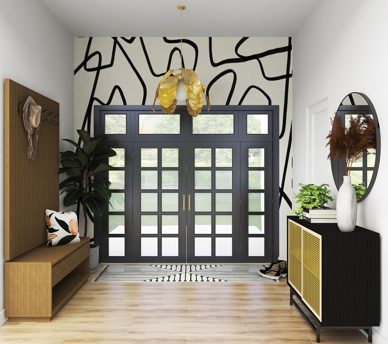 A uniquely designed palm pendant light illuminates the modern entrance space.