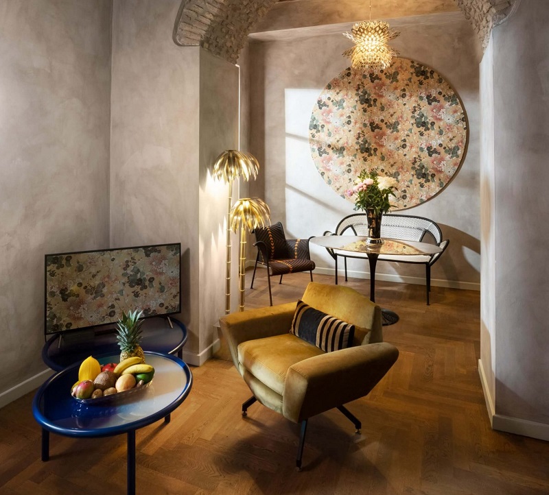 Boutique hotel with palm lamps and a variety of lighting styles