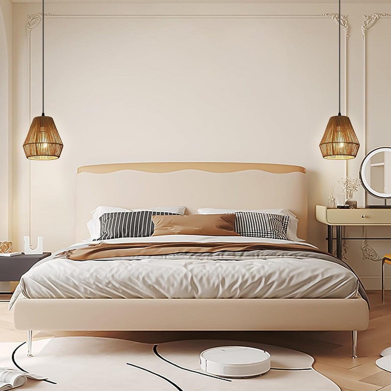Small palm pendant lights hanging above the bedside tables on both sides