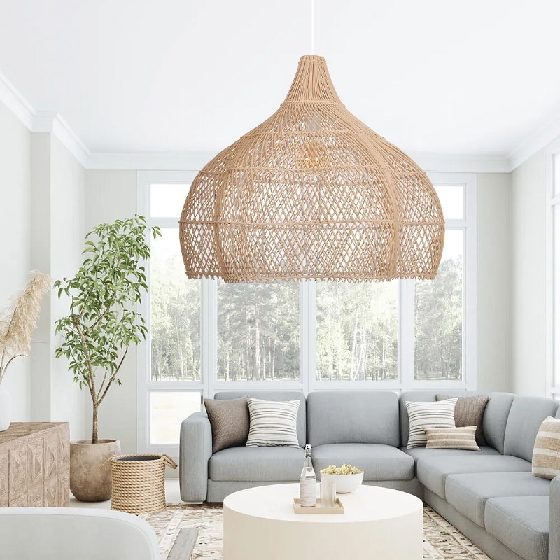 Large handmade rattan pendant light used as a focal point in a coastal interior design.